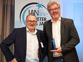 Peter Eckert and Bernd Häuslein from Bender with LANline Award
